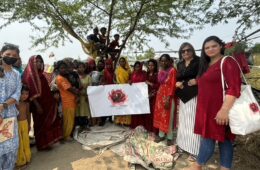 Talking about period health with some women who live in the slums.